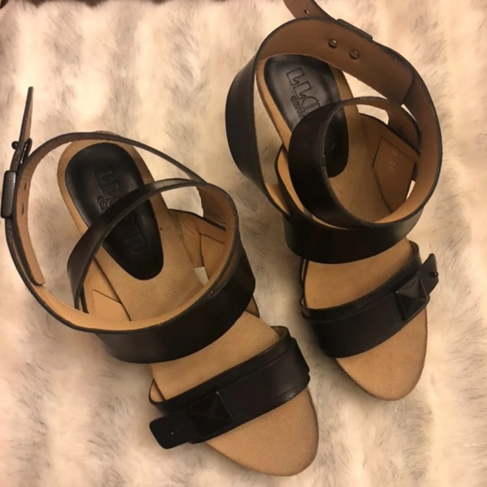 Lloyd Germany strap over black heels